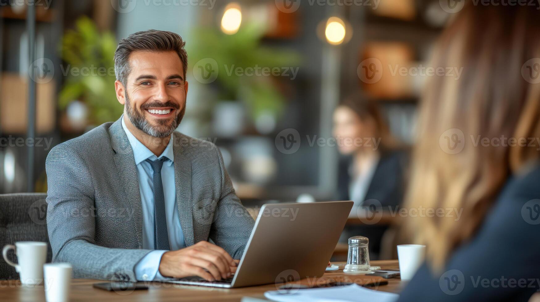 Business professionals engage in a meeting in a contemporary office environment photo