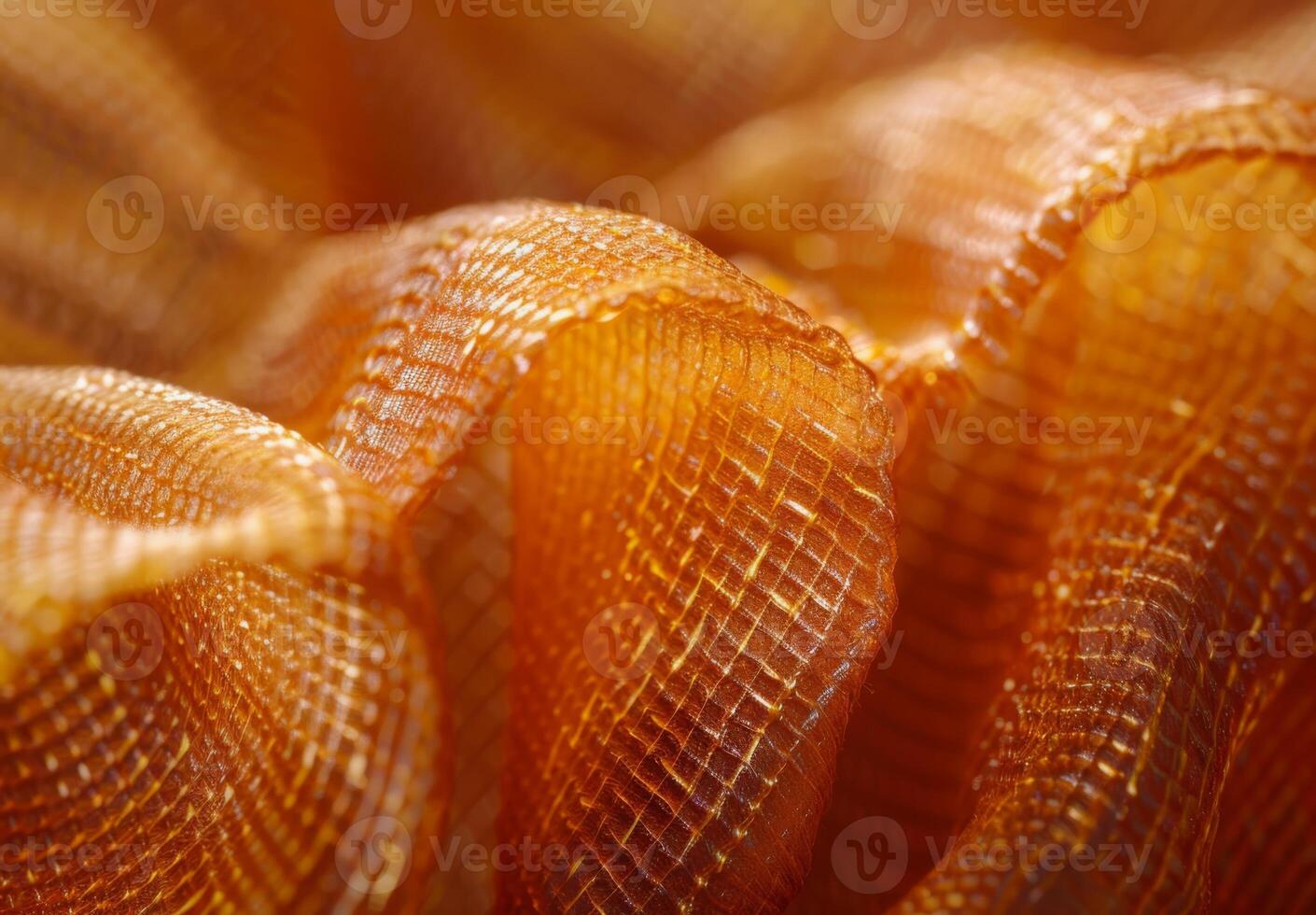 Extreme close-up macro photography of the intricate weave pattern of a piece of silk fabric photo