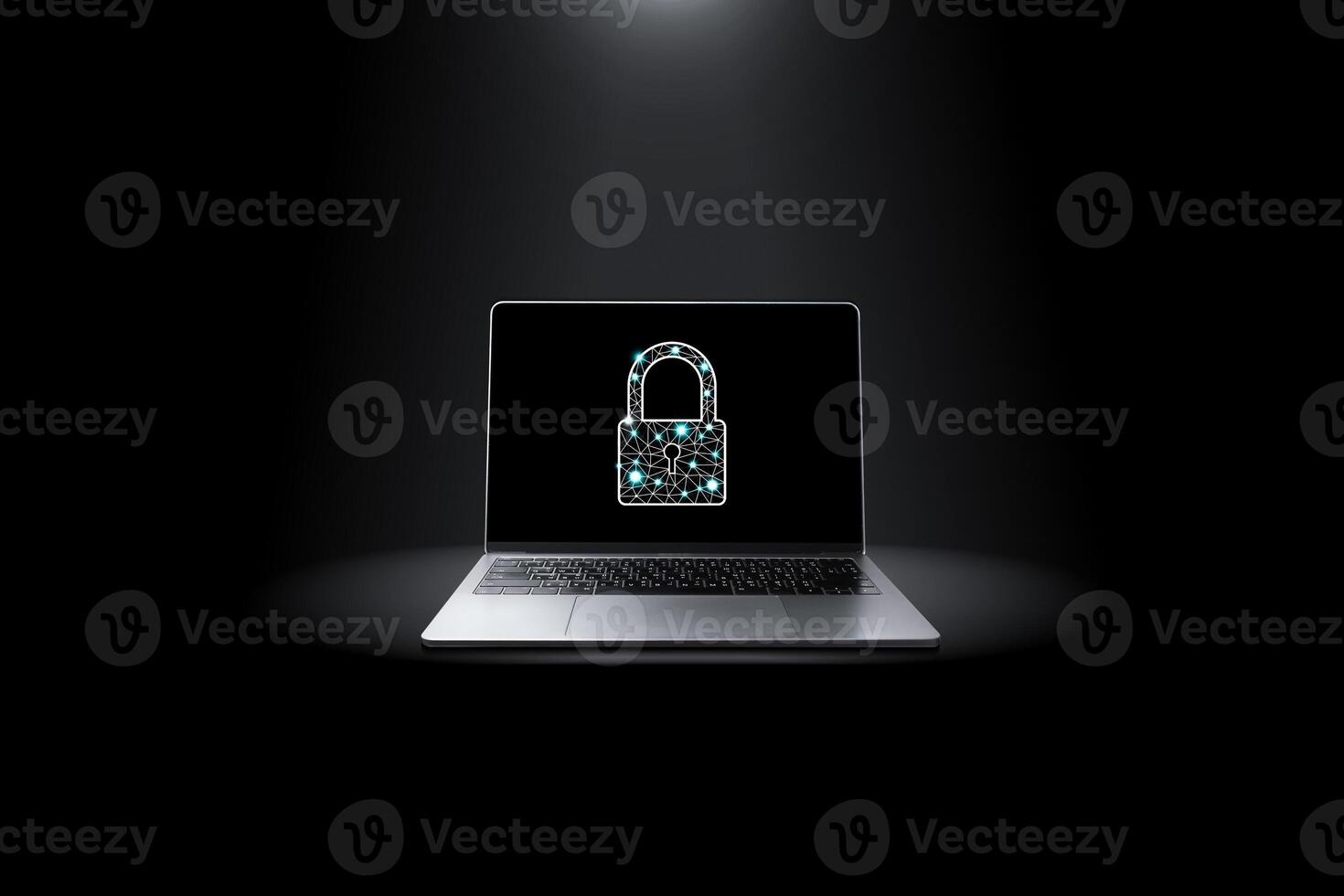 Computer network security technology concept , Grey laptop with important security key icons on the screen in a darkness background with lights shining down from above. photo