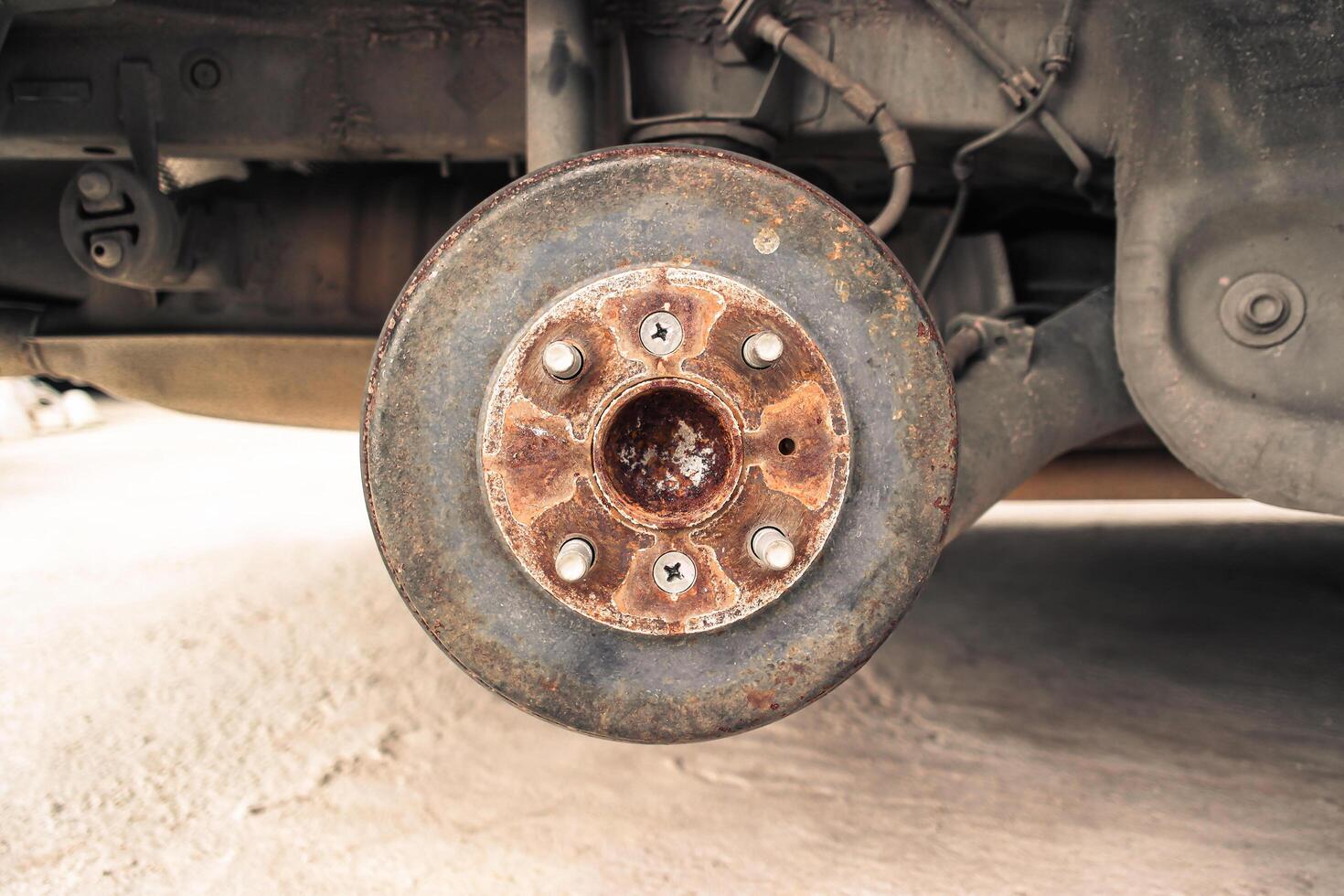 Outside an old drum brake without wheel of a car , Automotive parts concept photo