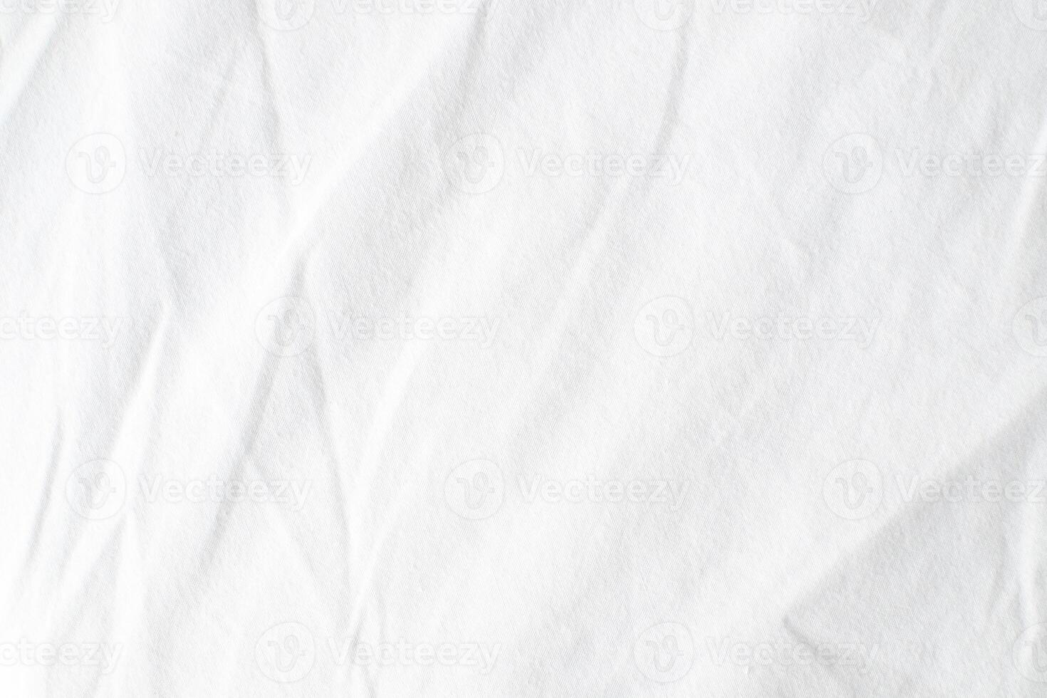 Abstract White Bedding Sheets or White wrinkled fabric background texture and Texture with copy-space Creased or wrinkled white fabric,Soft focus photo