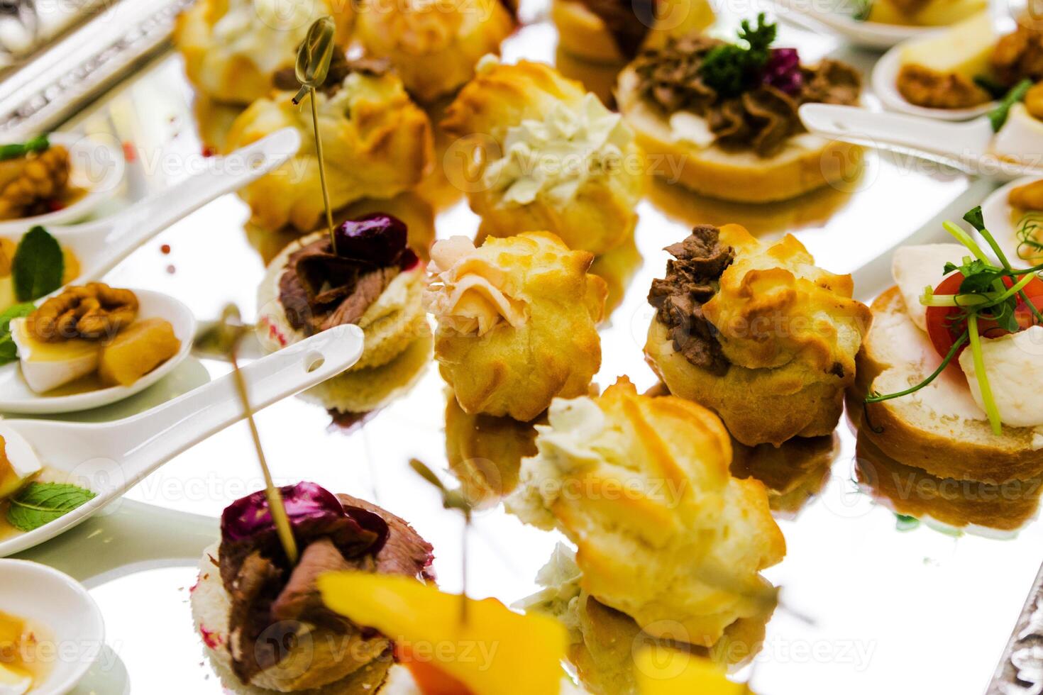Assorted Savory Pastries on Silver Tray photo