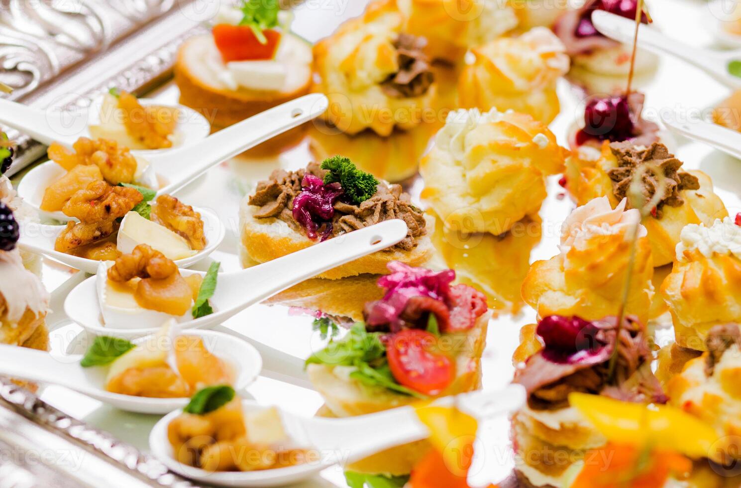 Assorted Appetizers on Silver Tray photo