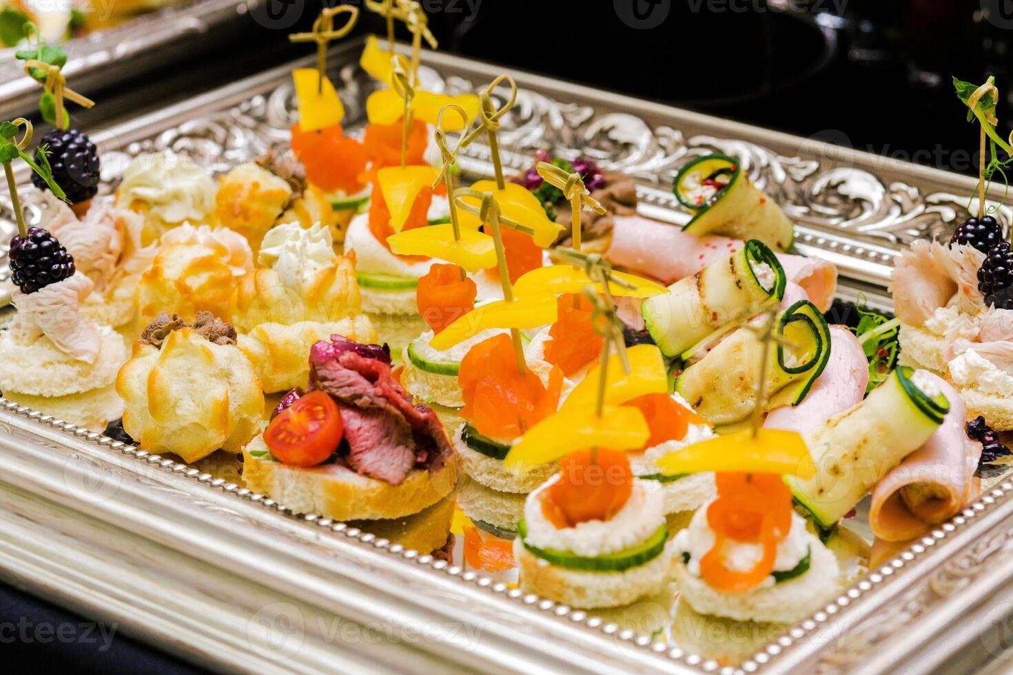 Assorted Finger Foods on Silver Tray photo