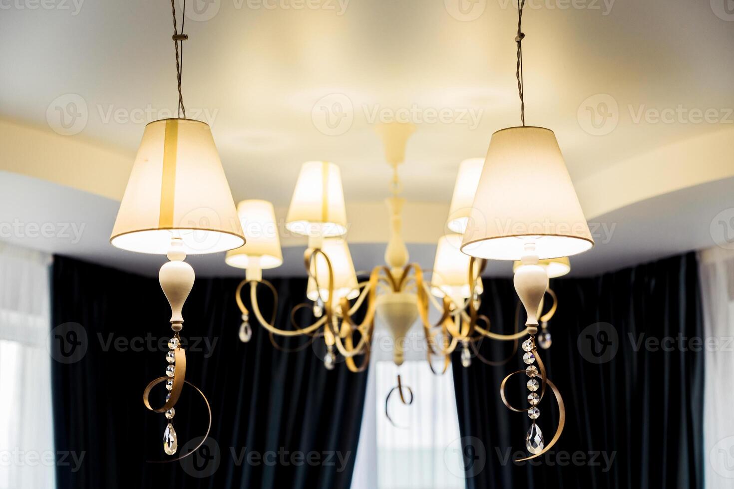 Elegant Chandeliers in Modern Home photo