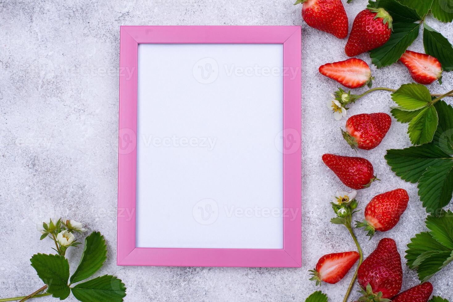 Strawberry with leaves and flowers photo