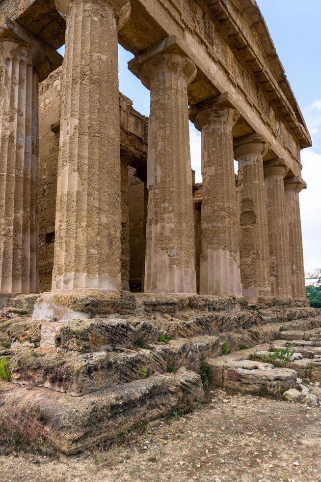 Agrigento, Italy-May 10, 2022-The Temple of Concordia inside the valley of the temples, an archaeological park near Agrigento during a sunny day photo