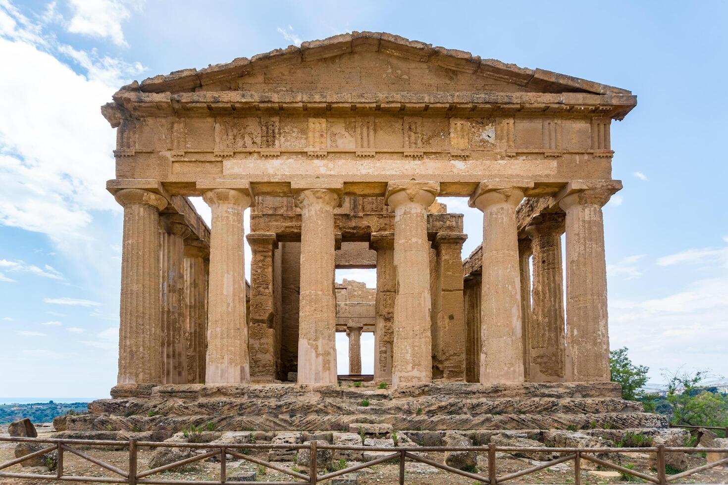 Agrigento, Italy-May 10, 2022-The Temple of Concordia inside the valley of the temples, an archaeological park near Agrigento during a sunny day photo