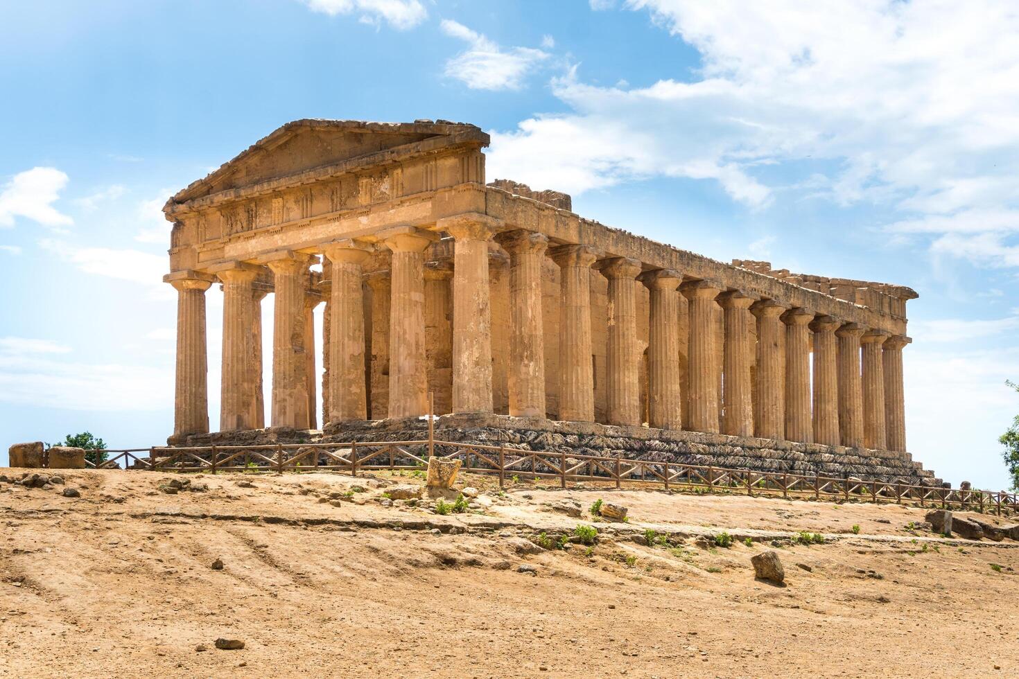 Agrigento, Italy-May 10, 2022-The Temple of Concordia inside the valley of the temples, an archaeological park near Agrigento during a sunny day photo