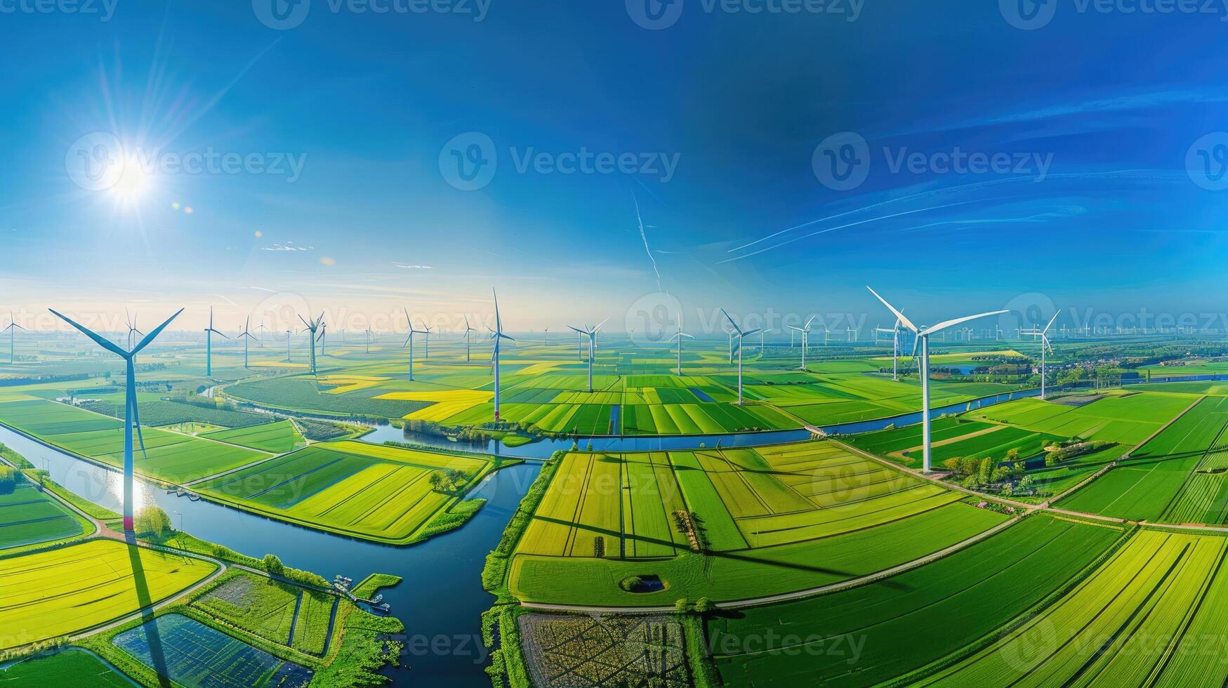 Dutch windmill park panorama, bright day with symmetrical turbines, green fields and canals, clear blue sky. Windmill park clean energy nehterlands photo