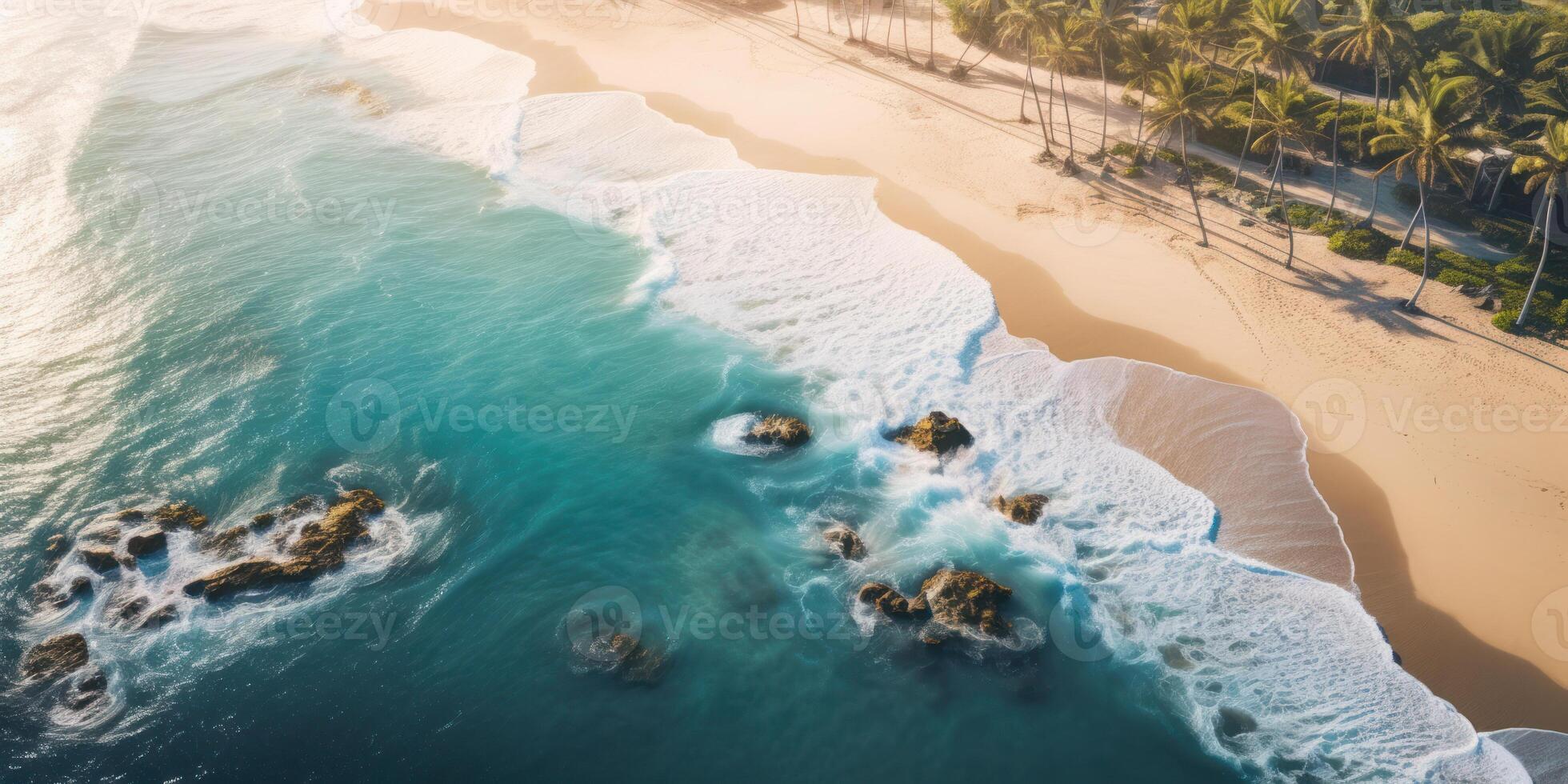 Aerial View Of Pristine Beach With Waves And Palm Trees. Sunrise Over Tropical Shoreline And Sea. photo