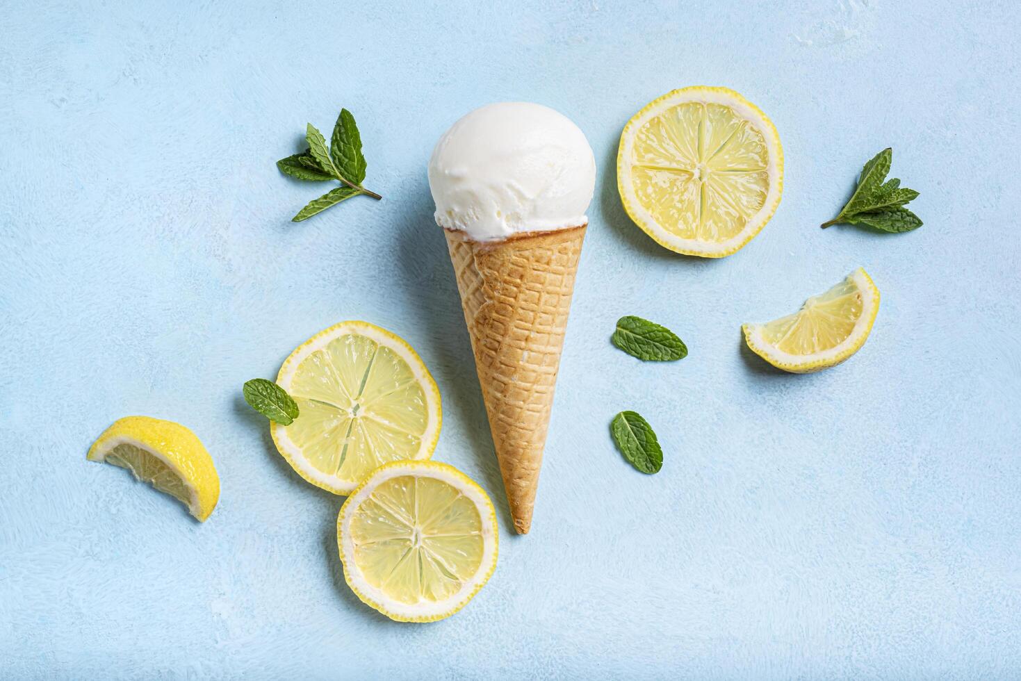 Lemon ice cream and lemon slices photo