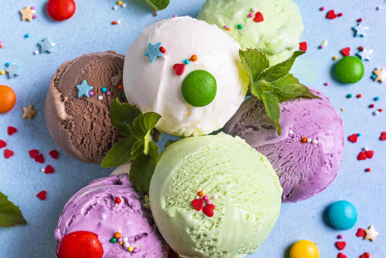 Various ice cream scoops with sprinkles photo