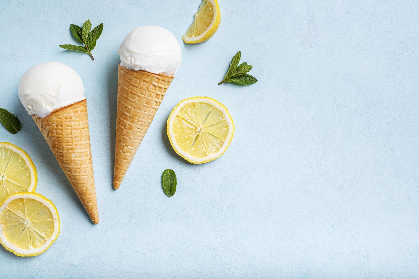 Lemon ice cream and lemon slices photo