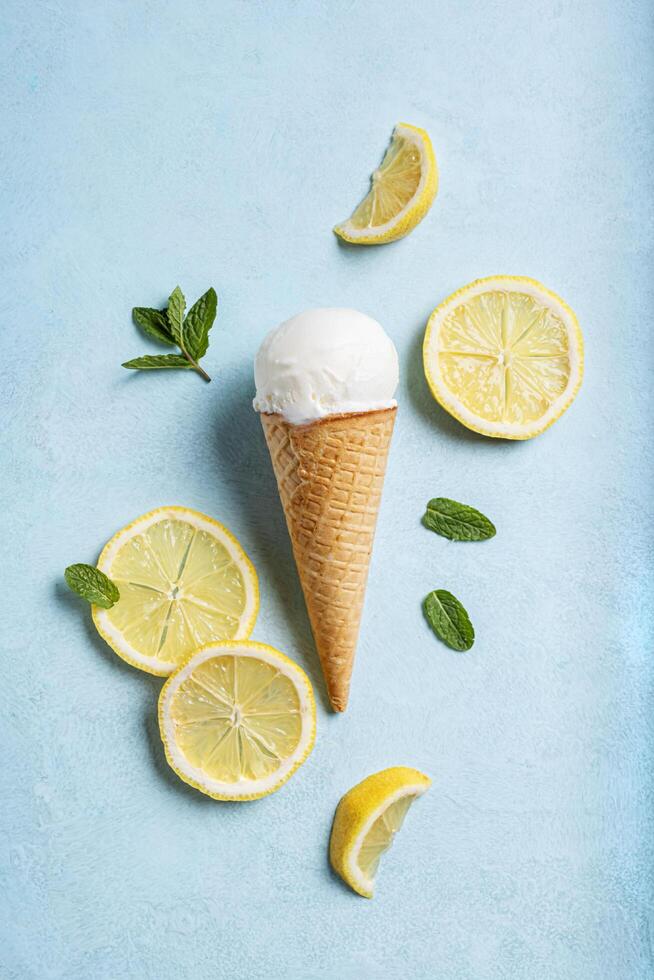 Lemon ice cream and lemon slices photo