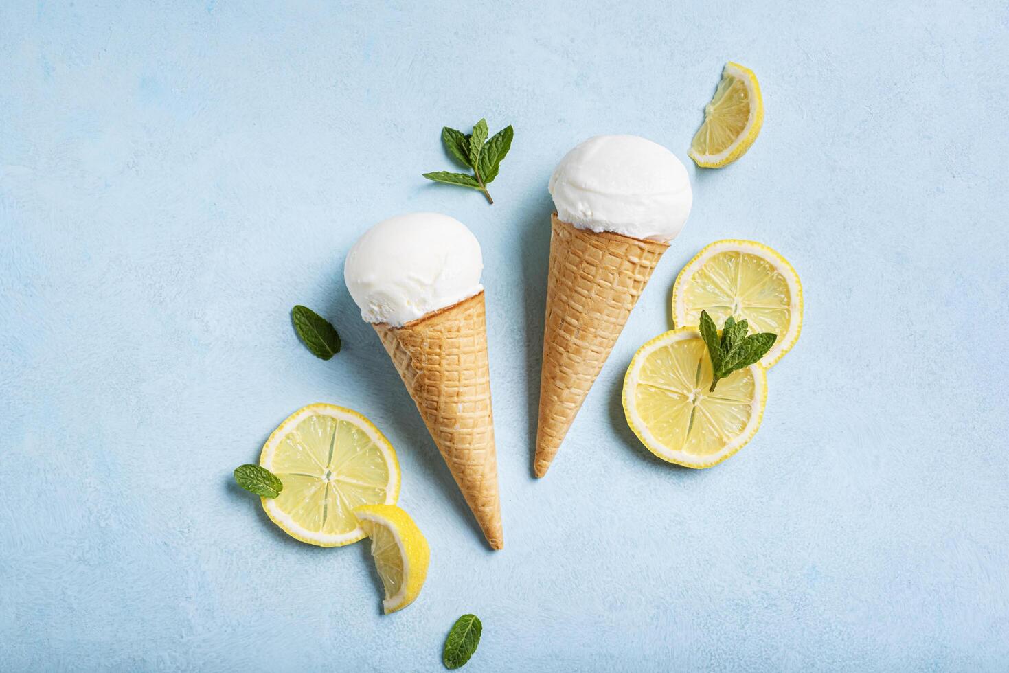 Lemon ice cream and lemon slices photo