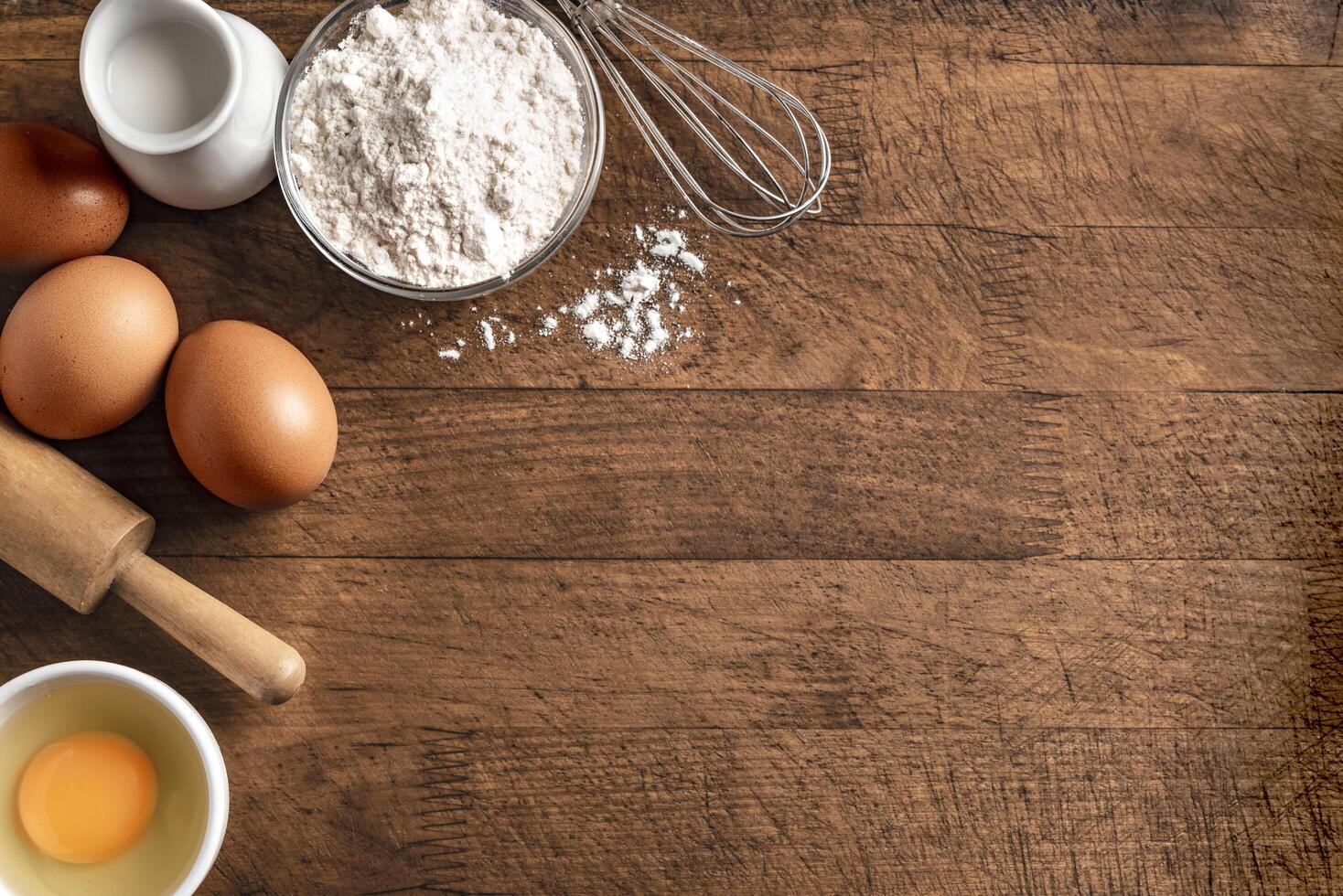 Baking background with flour, eggs, rolling pin. photo