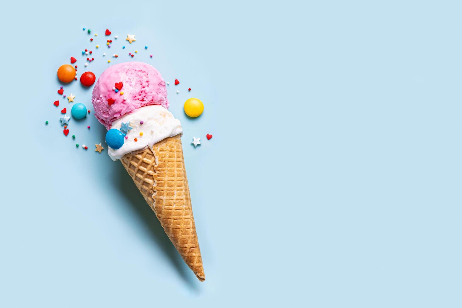 Ice Cream Cone With Sugar Sprinkles photo