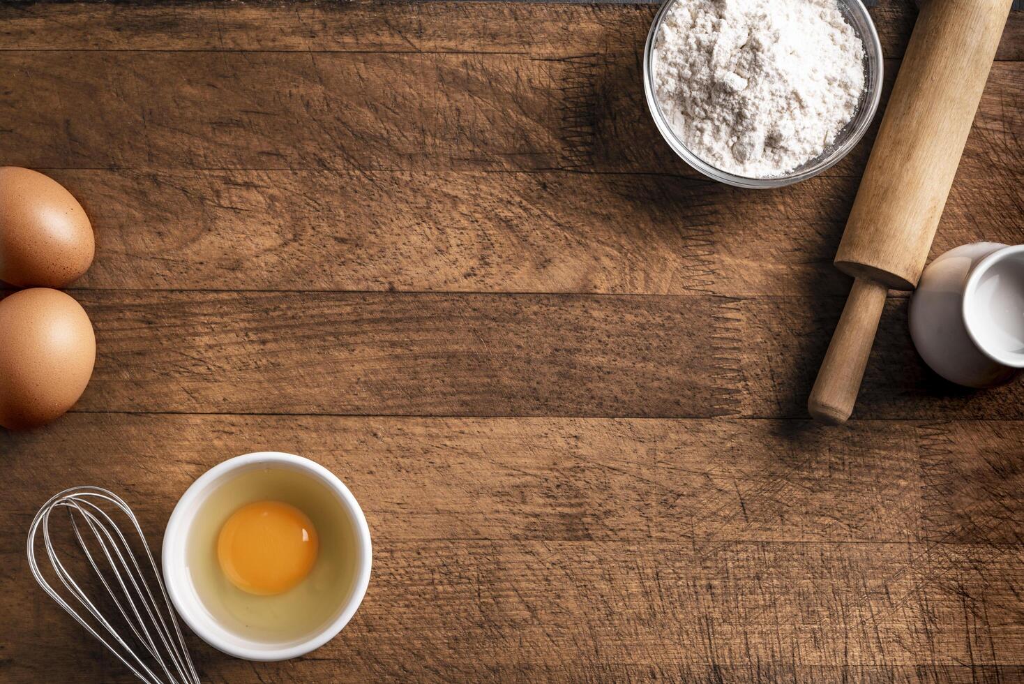 Baking background with flour, eggs, rolling pin. photo