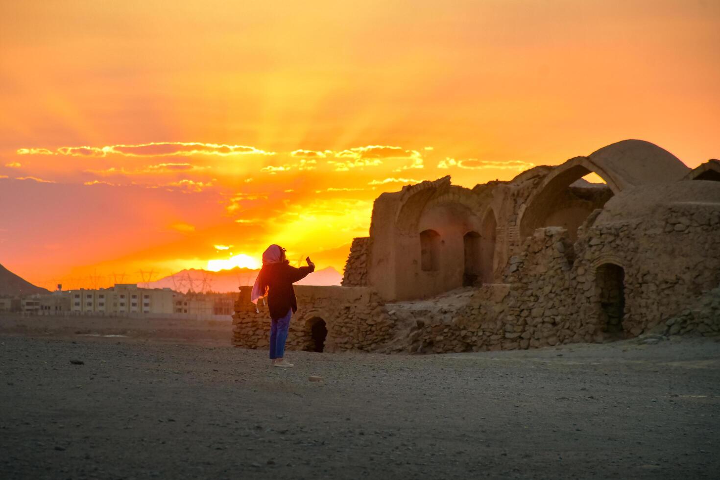 Yazd, Iran - May 2022 - Ruins of Zoroastrians Dakhmeh Towers of Silence in Yazd city photo