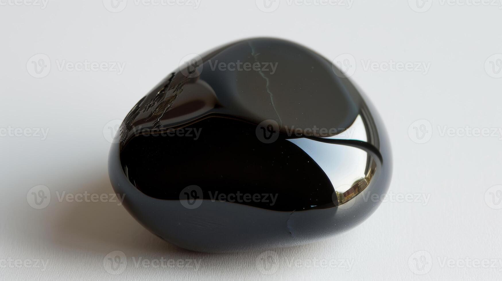 Elegant Polished Obsidian Gemstone CloseUp for Jewelry Design, Home Decor, and Spiritual Wellness photo