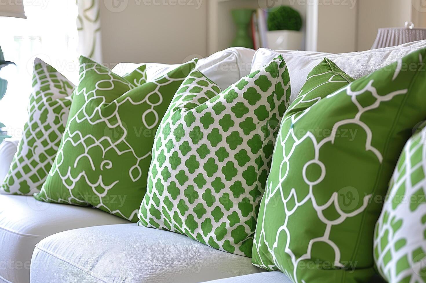 A cozy living room setup featuring a white sofa adorned with pillows photo