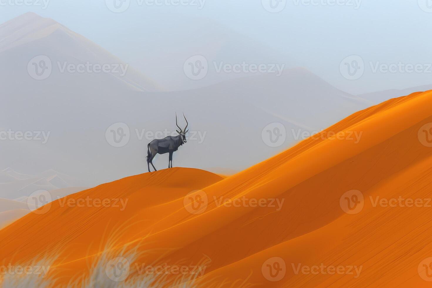 Lone antelope with long, elegant horns standing amidst the sprawling sand dunes of a vast desert, showcasing the raw beauty and serenity of nature. photo