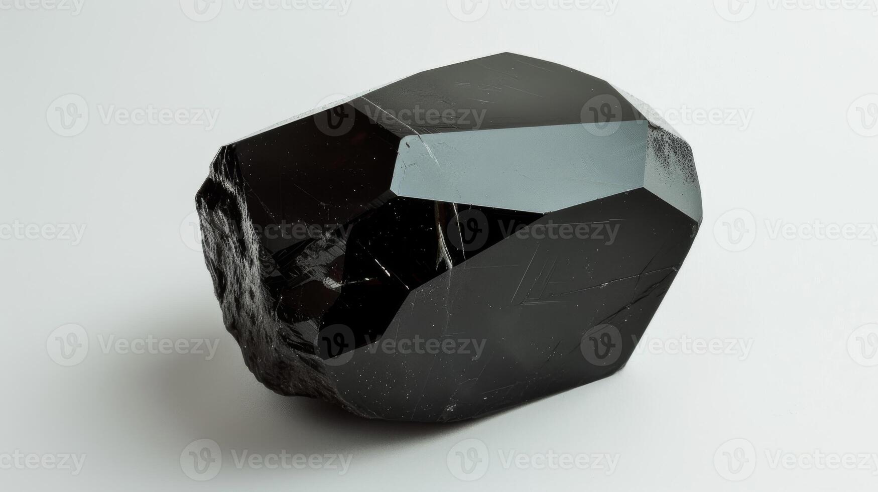 CloseUp Photograph of Polished Black Tourmaline Mineral Gemstone for Natural Healing and Jewelry Design photo