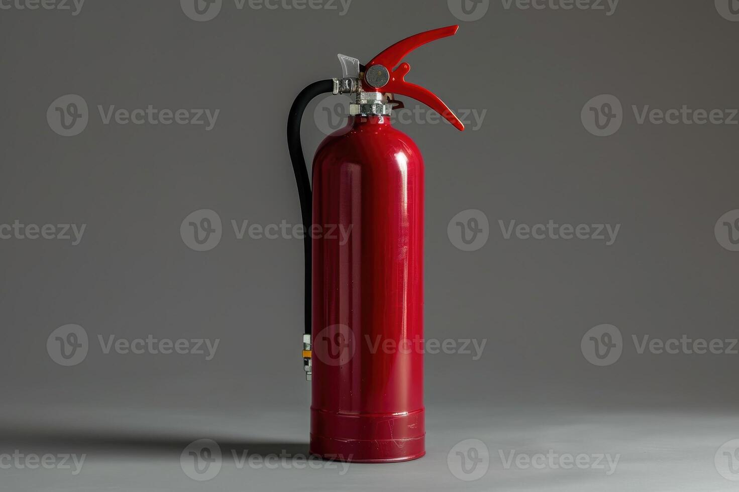 Red fire extinguisher, emphasizing safety equipment and fire prevention tools. photo