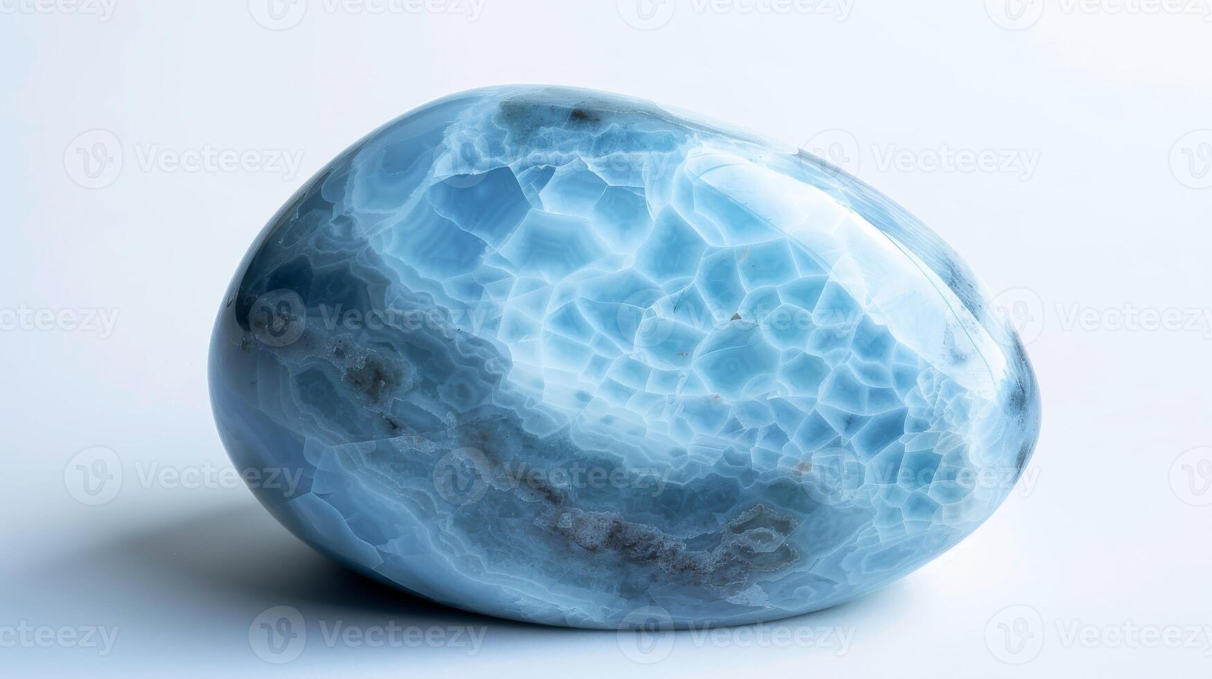 CloseUp of Polished Larimar Gemstone Showcasing Blue and White Patterns, Perfect for Design, Posters, and NatureThemed Art photo
