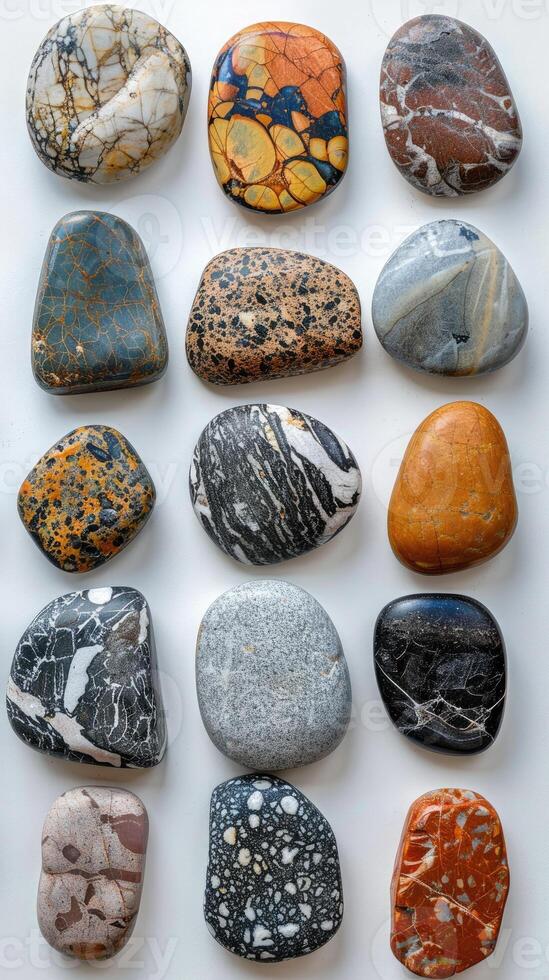 Colorful and varied collection of smooth river stones photo