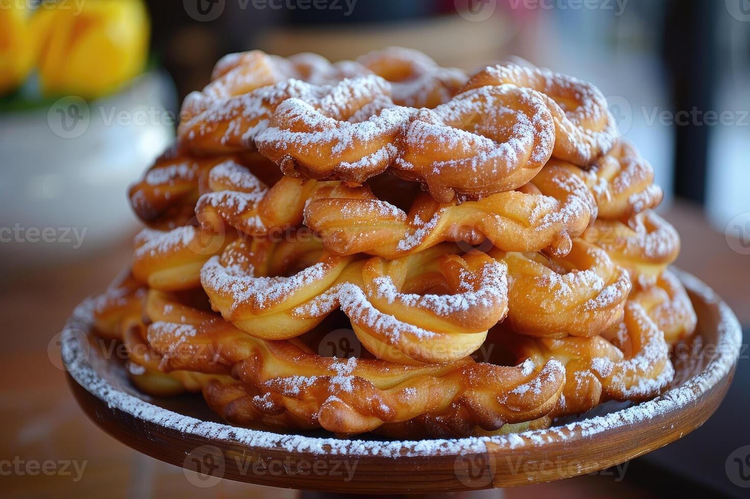 Light and crispy fried dough, dusted with powdered sugar and served piping hot. photo