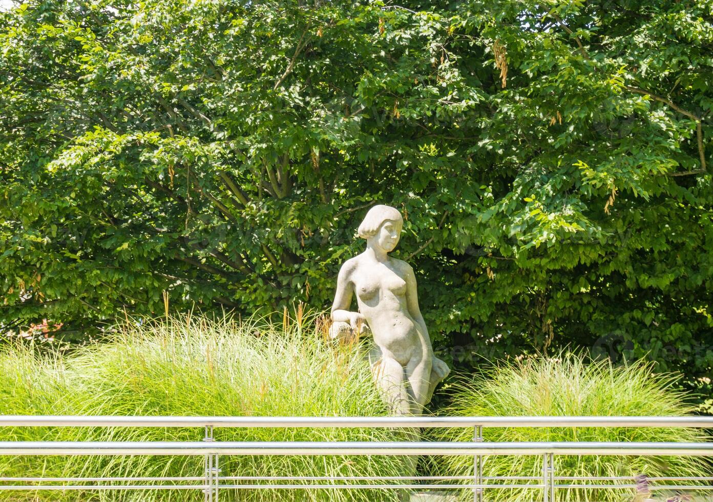 Podebrady- Czech- 27 July 2024. Leda with swan and park promenade, spa town photo