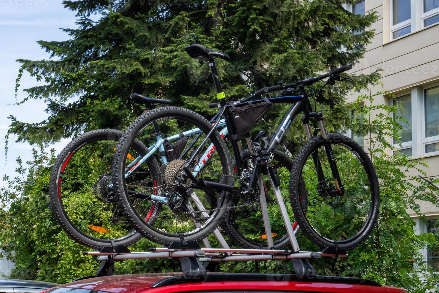 Transporting Bicycles on Car Roof for a Summer Adventure.Exploring the Open Road photo