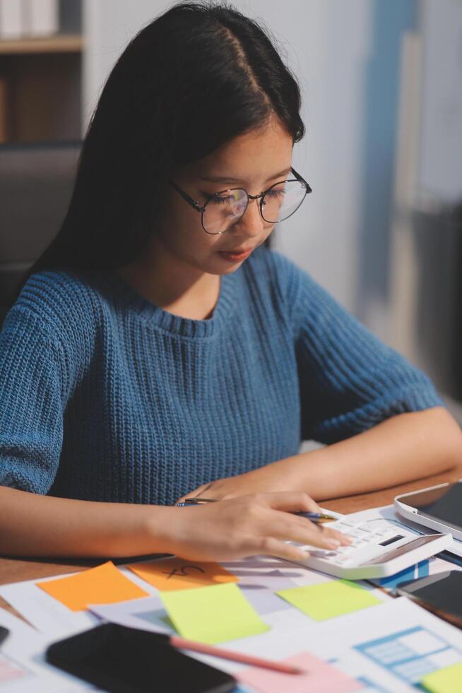 The designer team is designing the uxui system to make the uxui system work well on new phones and support system updates. Website development concept UI UX front end designer photo