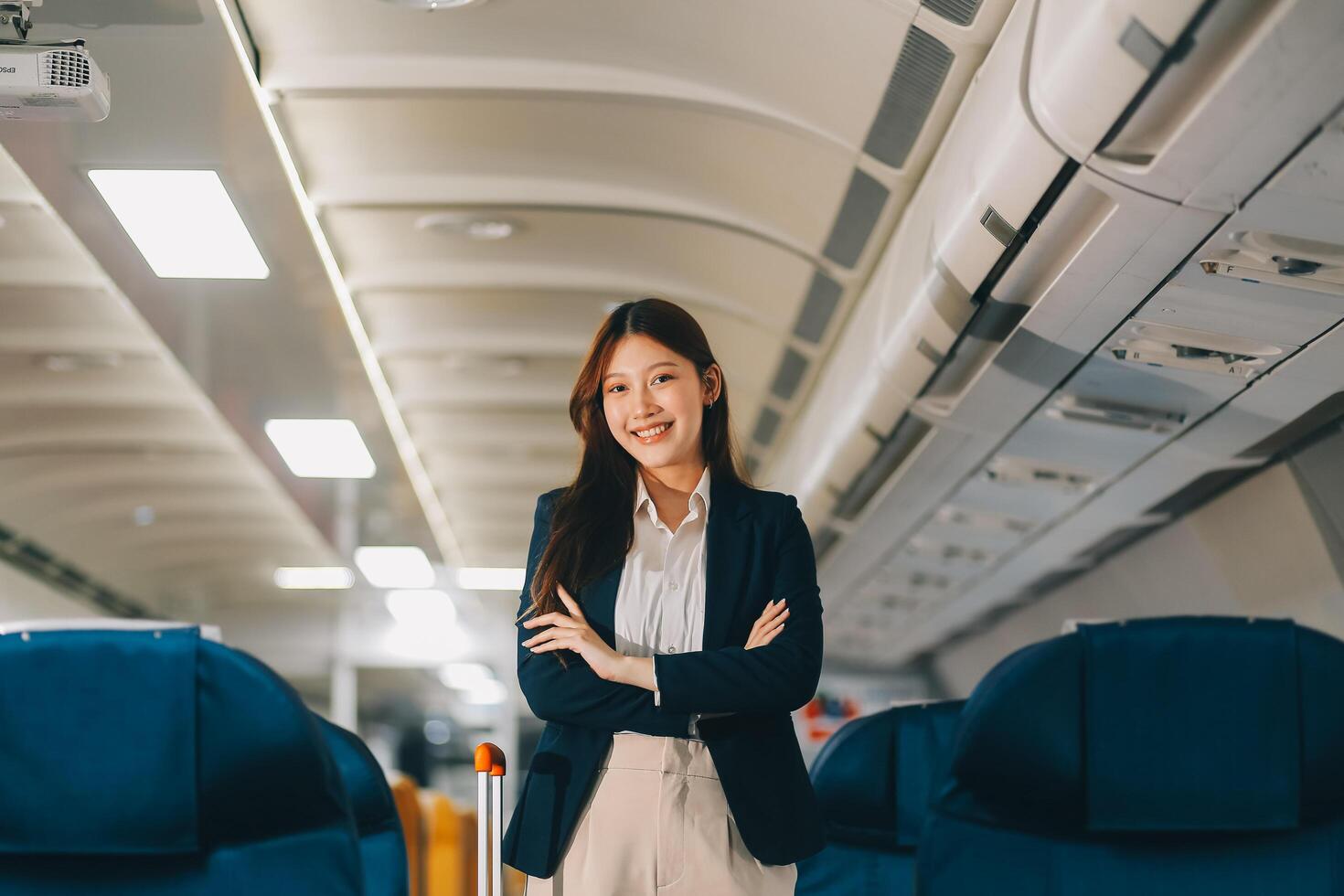 Asian young women passenger walk in airport terminal to boarding gate. Attractive beautiful female tourist friends feeling happy and excited to go travel abroad by airplane for holiday vacation trip. photo