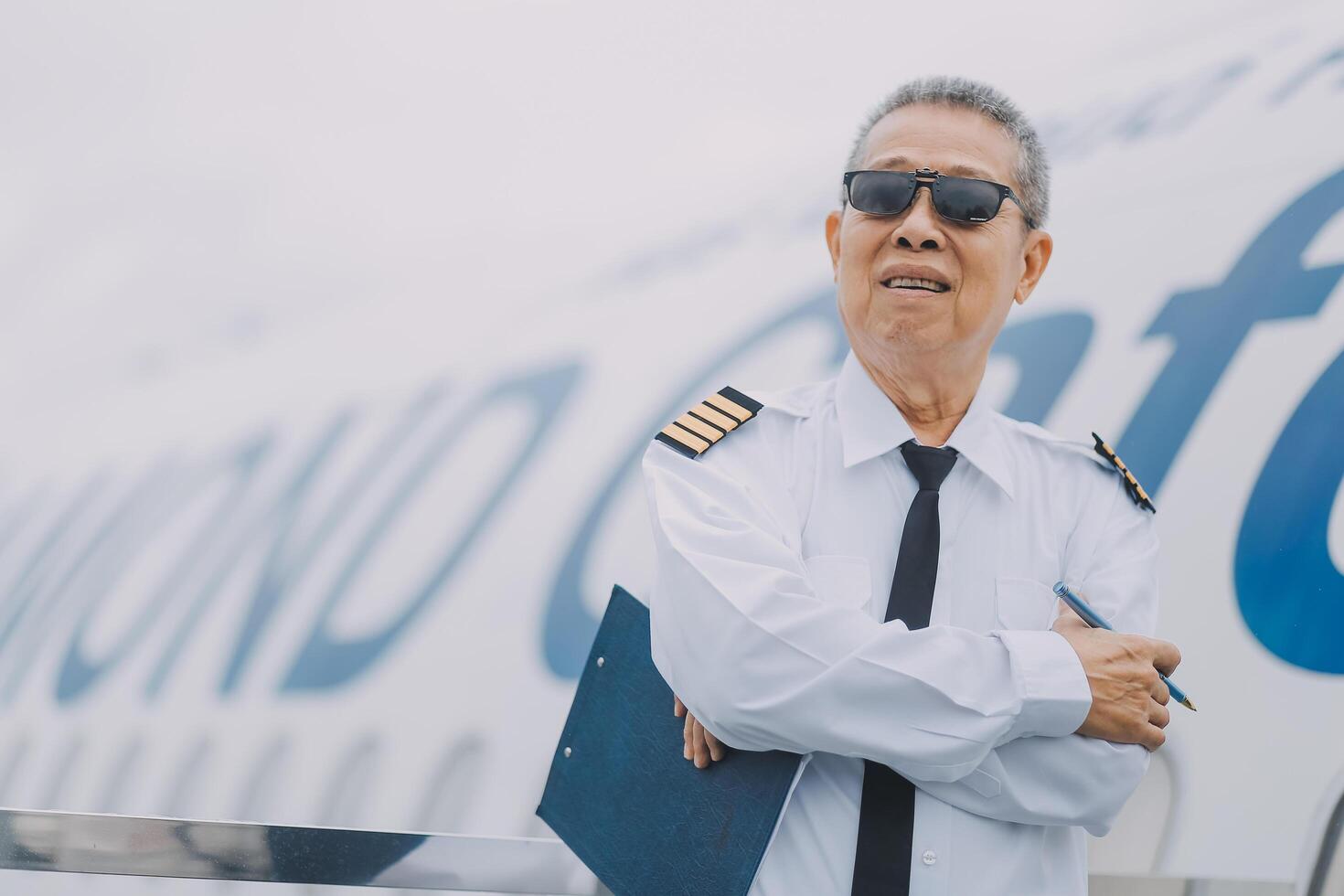 Professional pilot woman in uniform has teamwork meeting for success flight in aviation business. Young female captain instructor sitting in office and working or training commercial airline crew. photo