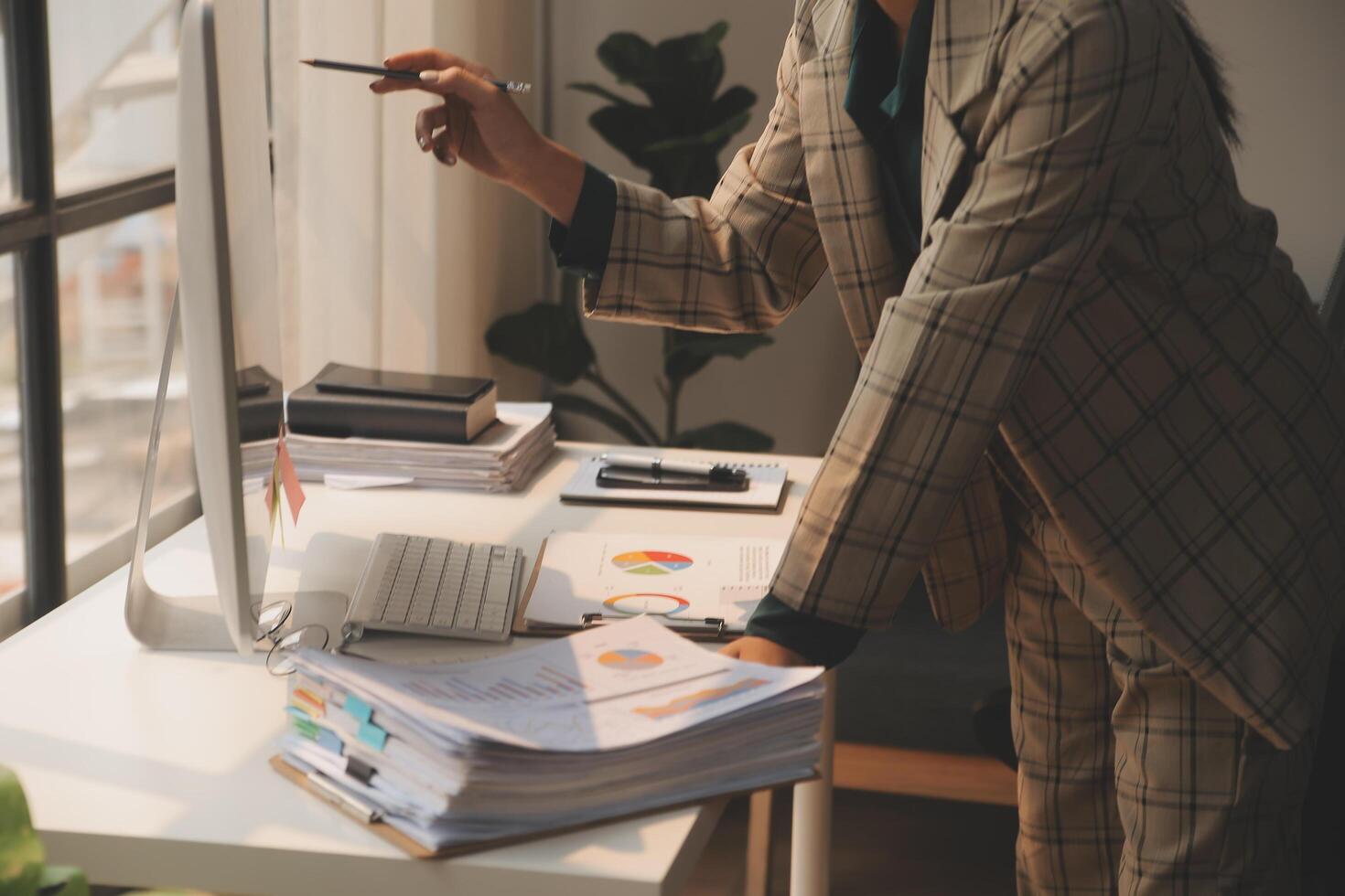 Team of business people working together in the meeting room office, teamwork background charts and graphs banner, double exposure successful teamwork,business planning concept. photo