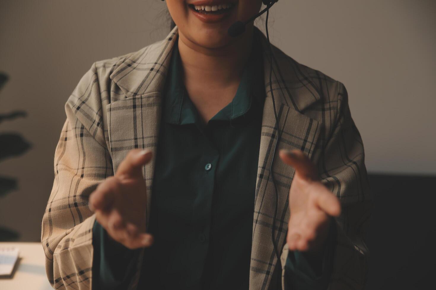 Call center, computer and business with woman in office for customer service, technical support and advice. Technology, contact us and communication with employee operator in help desk agency photo