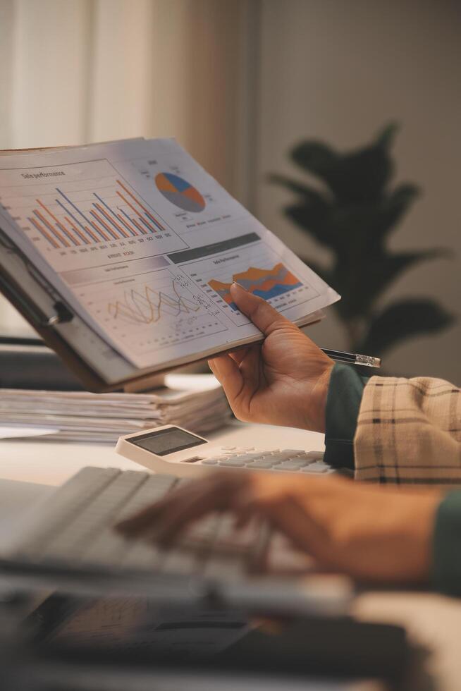 Team of business people working together in the meeting room office, teamwork background charts and graphs banner, double exposure successful teamwork,business planning concept. photo