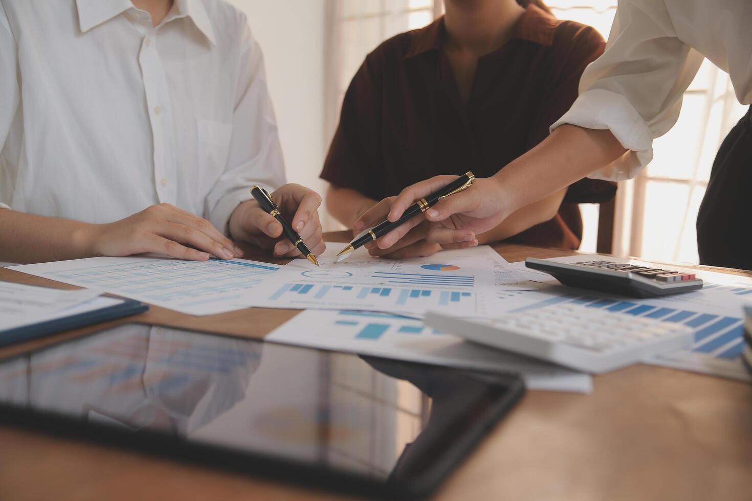 Business meetings to analyze investment strategies and brainstorm sales plans for a more profitable business. photo