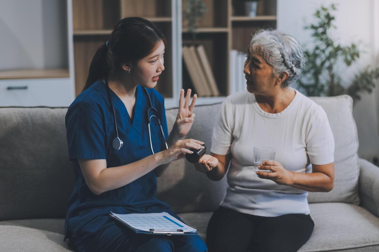 Doctor consulting with patient discussing something and Presenting results on report, Medicine and health care concept. photo