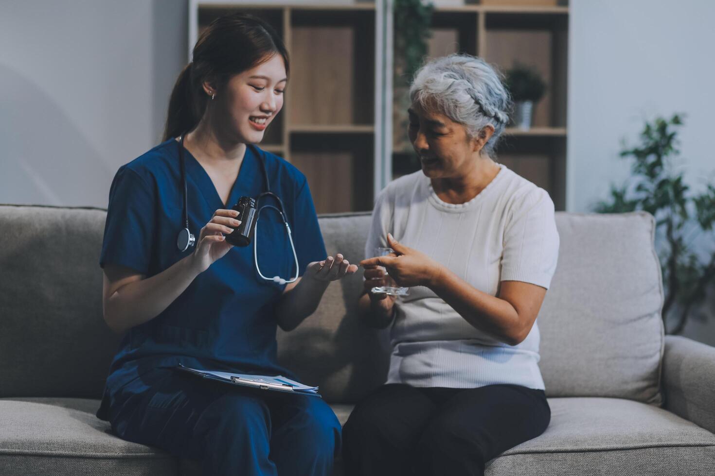 Doctor consulting with patient discussing something and Presenting results on report, Medicine and health care concept. photo