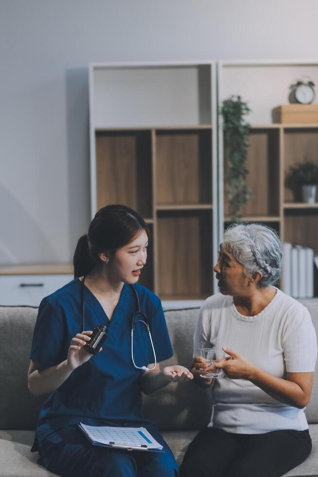 Doctor consulting with patient discussing something and Presenting results on report, Medicine and health care concept. photo
