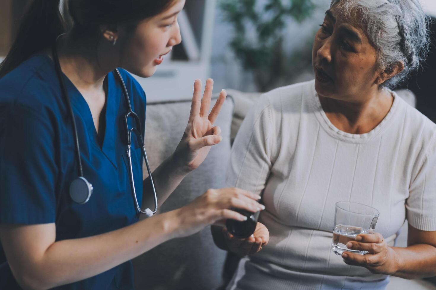 Doctor consulting with patient discussing something and Presenting results on report, Medicine and health care concept. photo