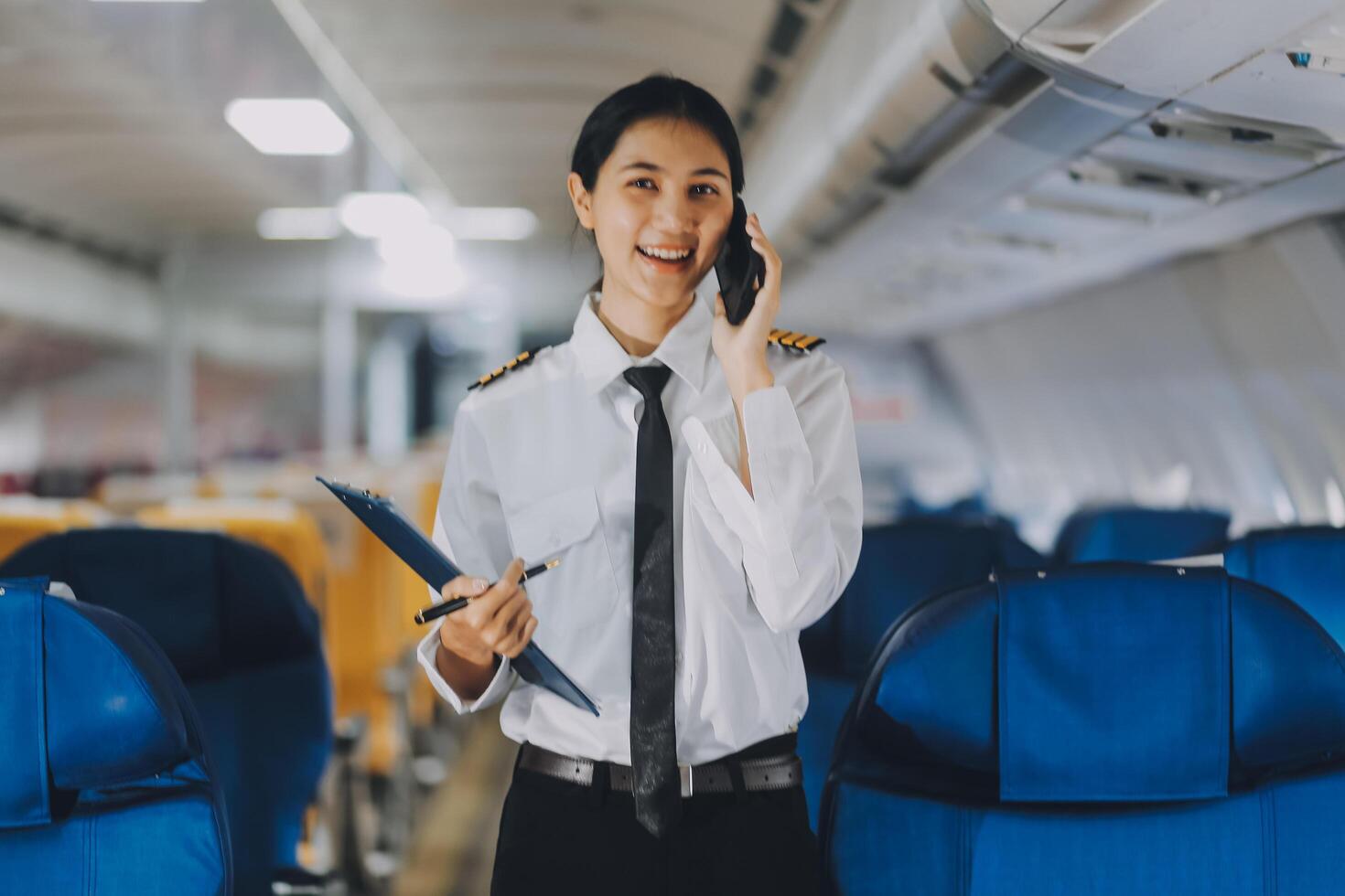 Texting on mobile chat app, Thoughtful asian people female person onboard, airplane window, perfectly capture the anticipation and excitement of holiday travel. chinese, japanese people. photo