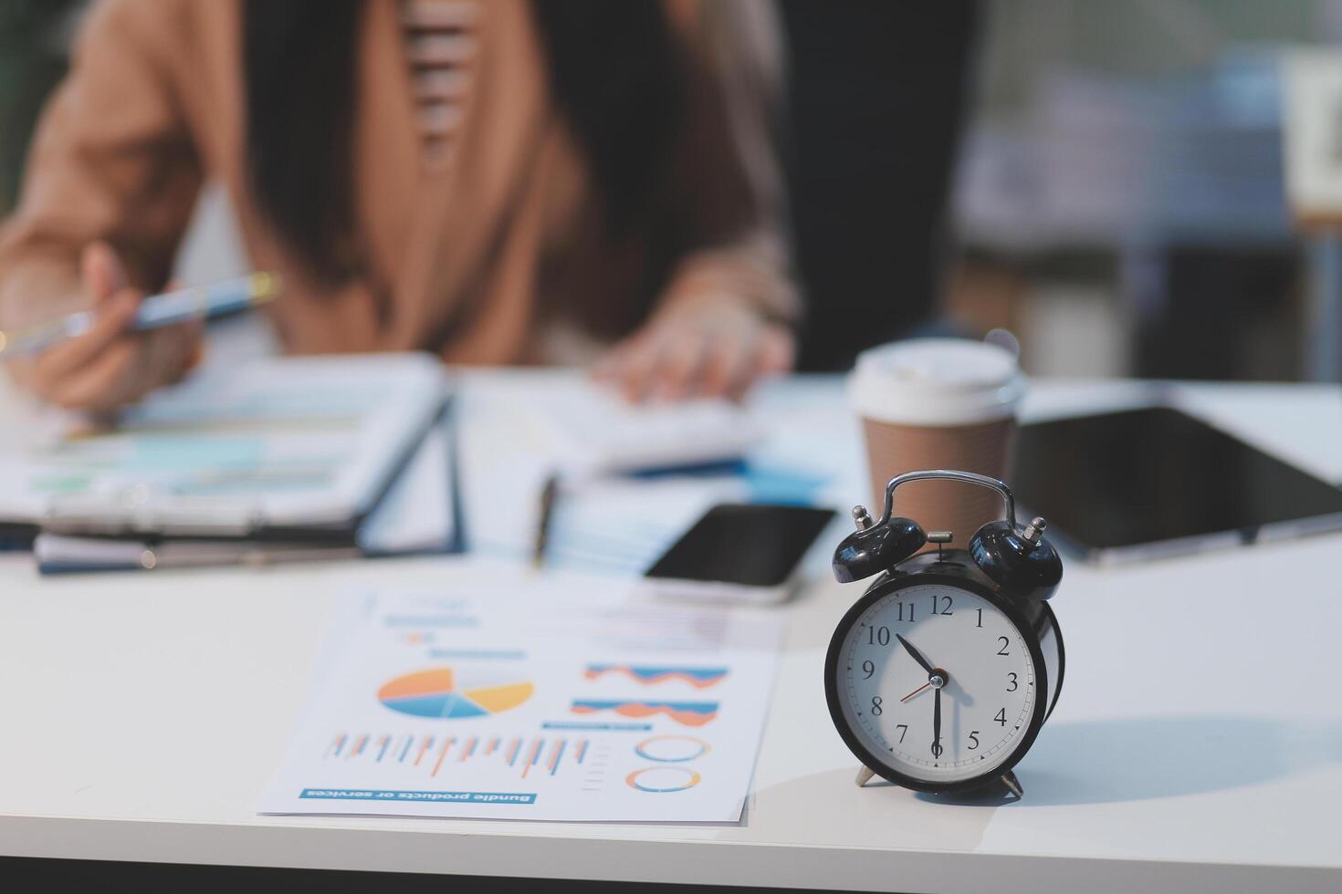 Business woman accountant working audit and calculating expense financial annual financial report balance sheet statement, doing finance making notes on paper checking document. photo