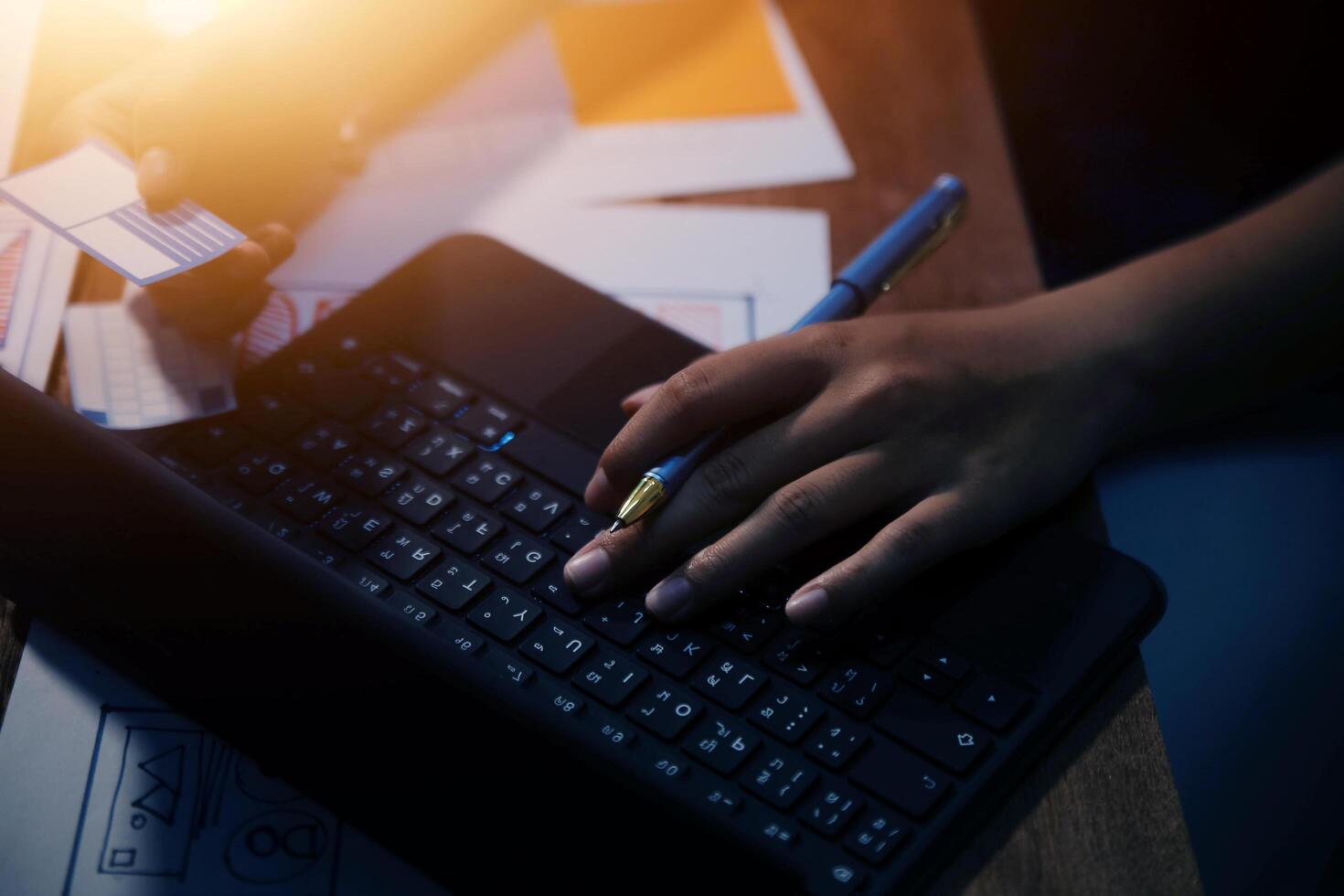 The designer team is designing the uxui system to make the uxui system work well on new phones and support system updates. Website development concept UI UX front end designer photo