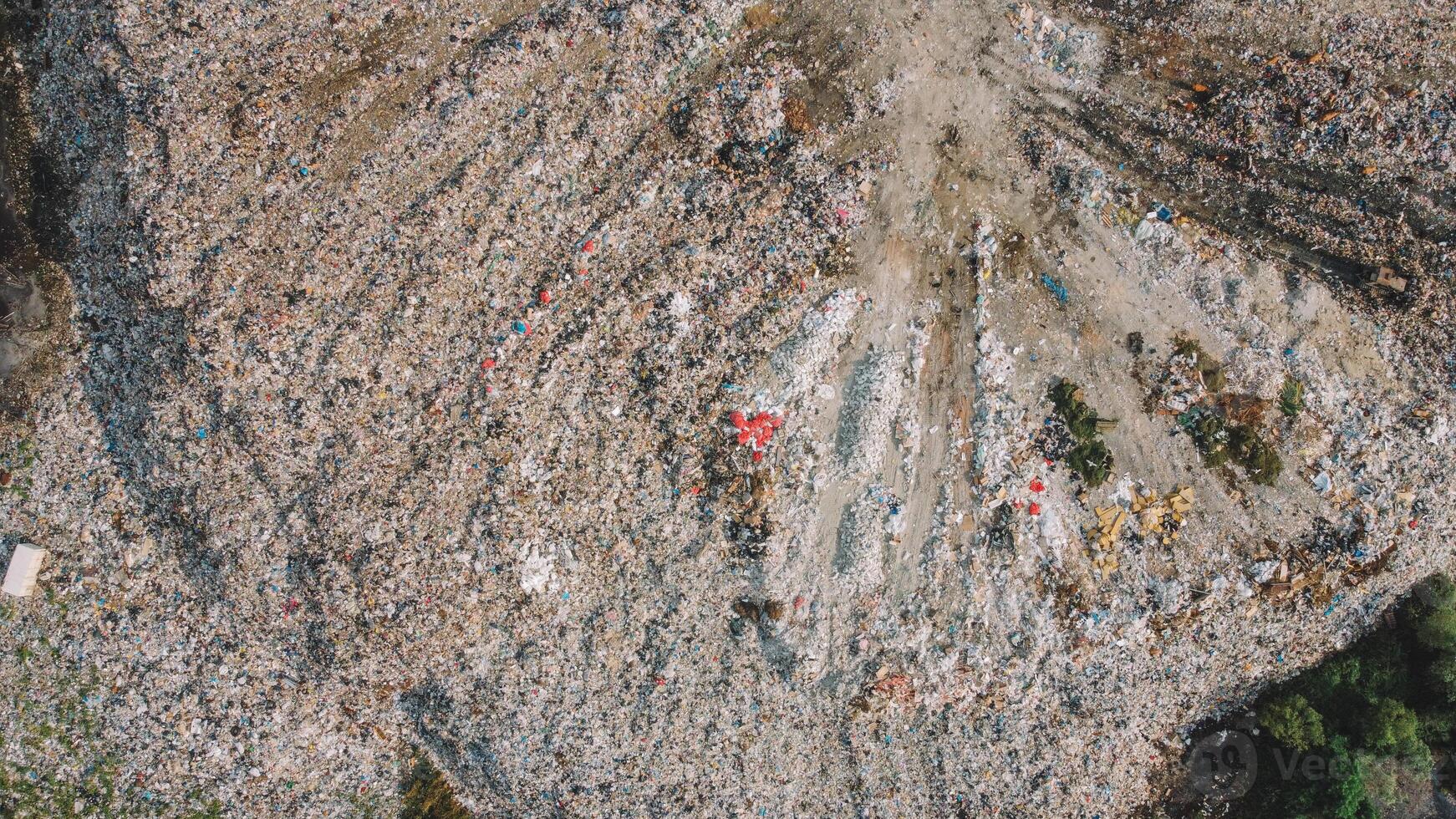 Garbage Vs Nature Stark Contrast. Mountains Of Trash Aerial. photo