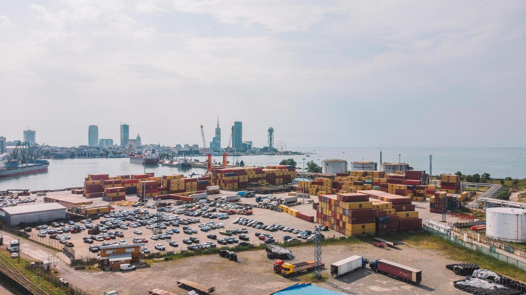 Shipping Containers In Warehouse Aerial. Aerial View Of Container Yard photo